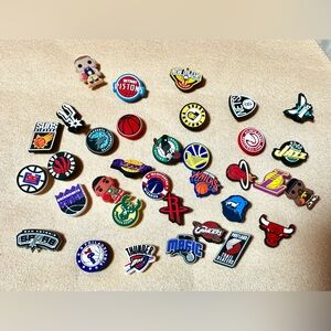 NBA-themed Jibbitz shoe charms, designed to personalize Crocs footwear